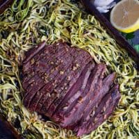 cooked sheet pan oven baked steak recipe with zucchini noodles sliced