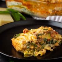 Serving of Zucchini-Lasagna served on a black plate