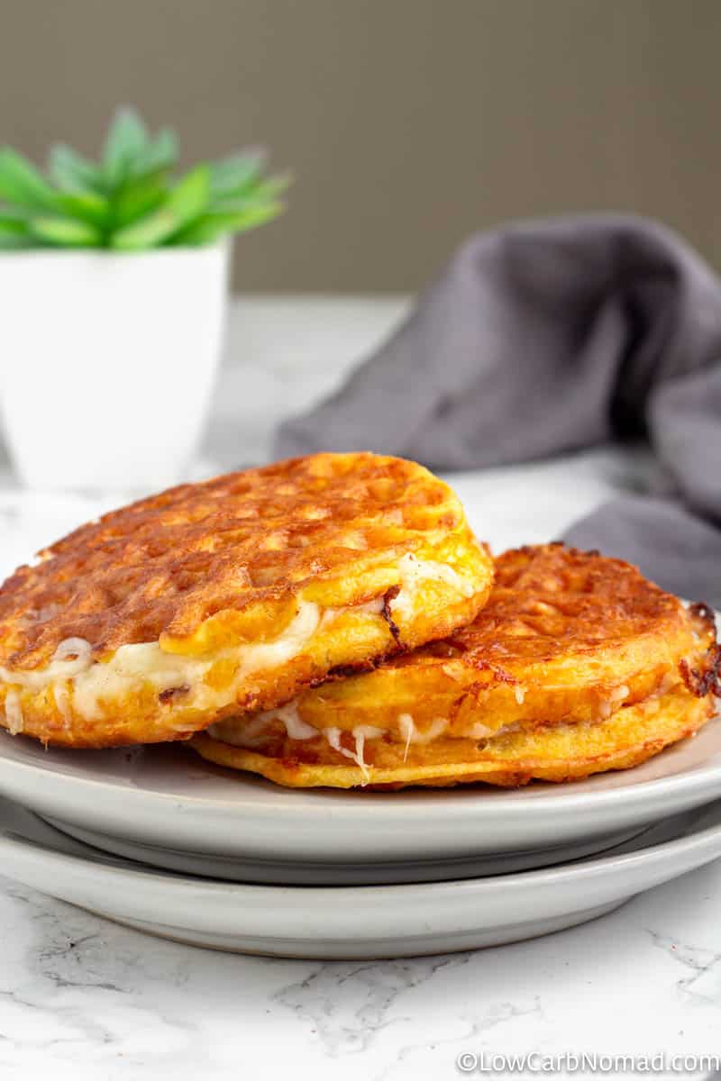 Grilled Cheese Chaffle on a plate with a side salad