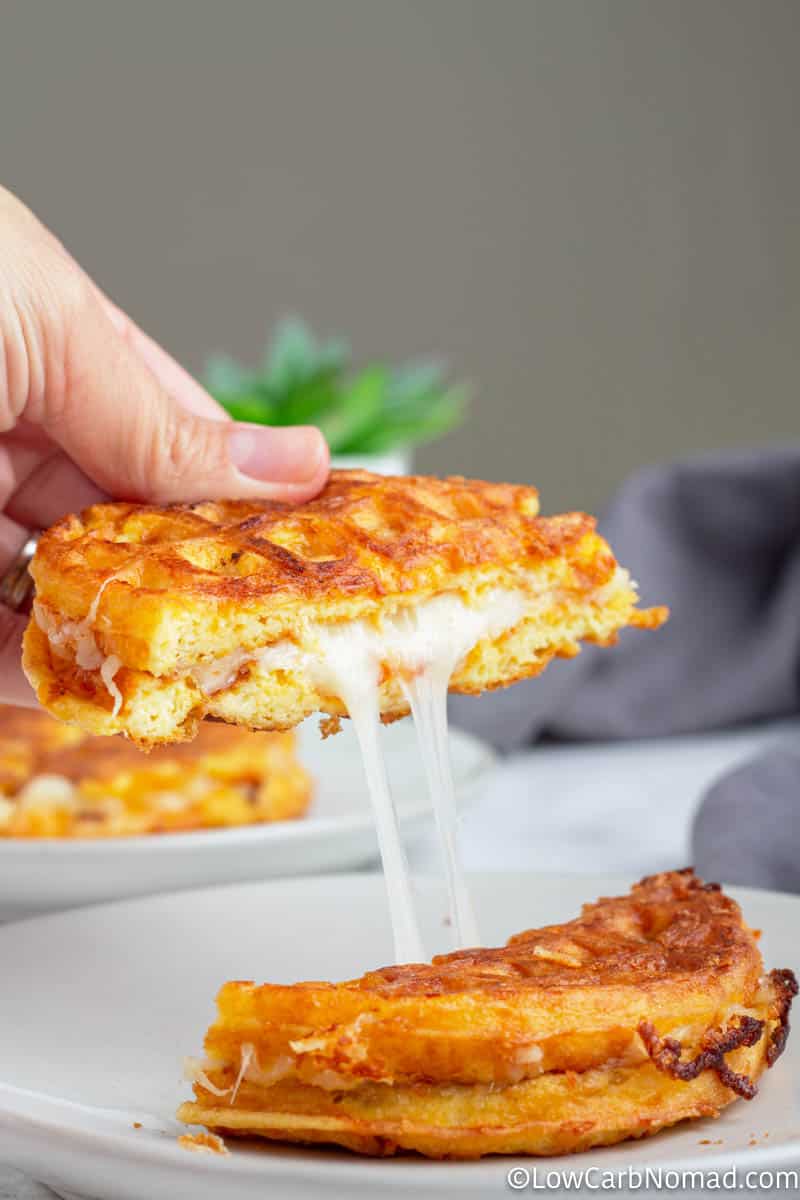 Grilled Cheese Chaffle on a plate with a side salad