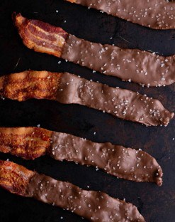 Low carb chocolate covered bacon on a tray