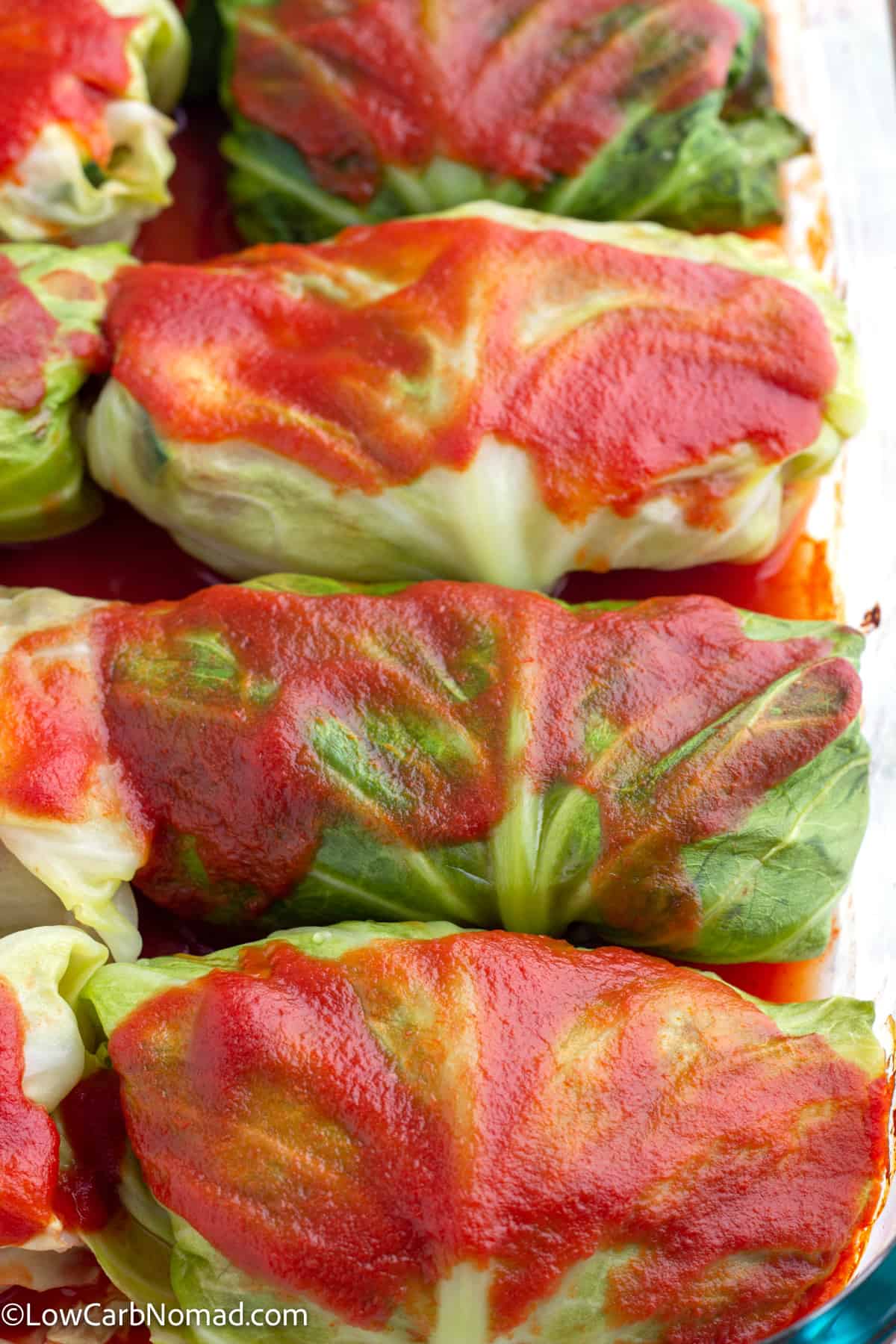 close up photo of cabbage rolls in a baking dish