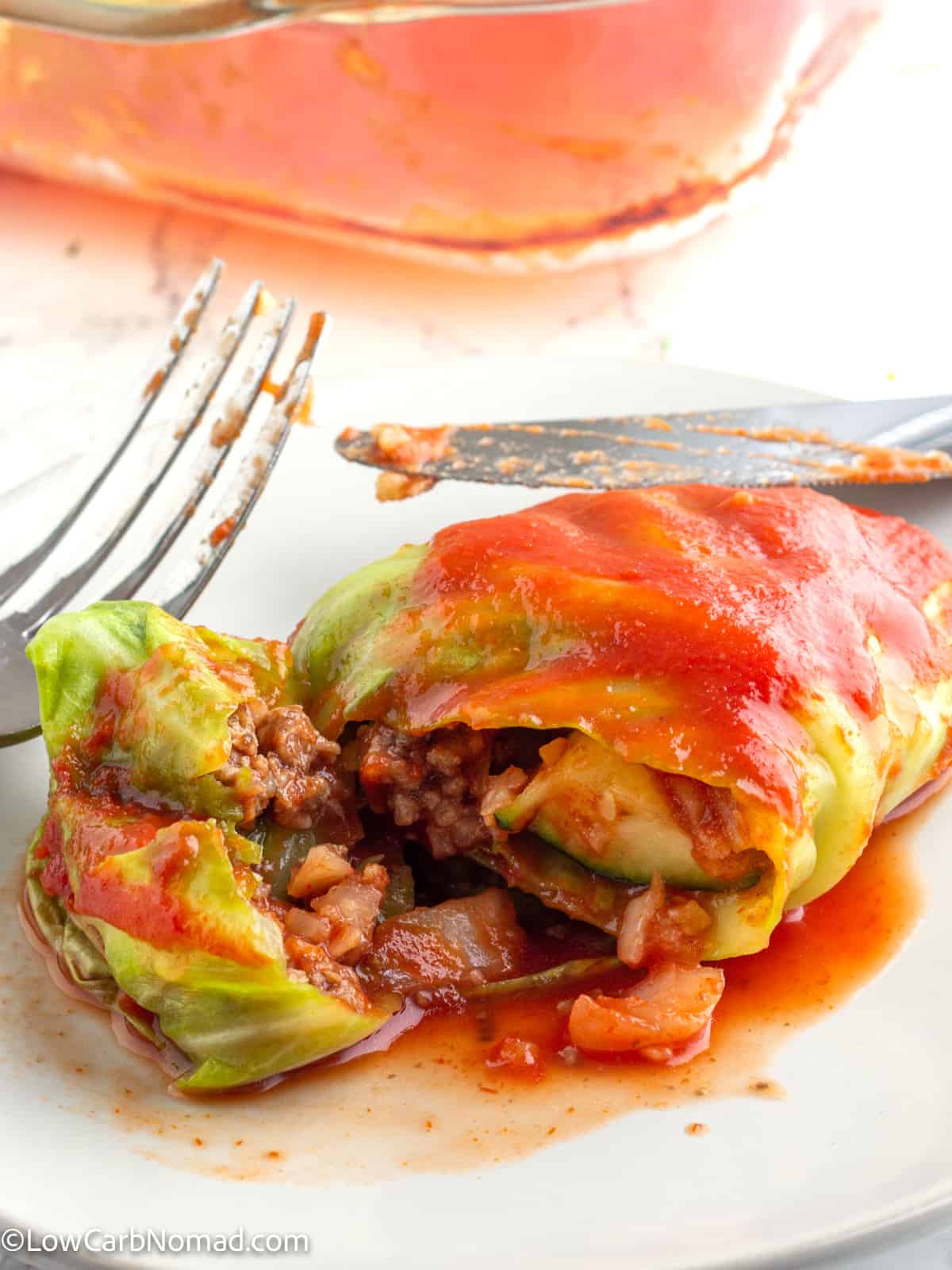 close up photo of cut open cabbage roll on a plate