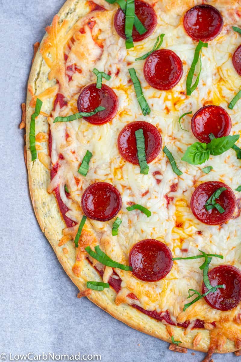 Low Carb Pizza crust topped with melted cheese and pepperoni