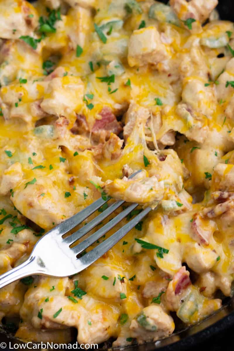 Easy Chicken Jalapeno Skillet recipe ready to be eaten right out of the oven with gooey cheese