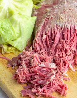Easy Crockpot corned beef and cabbage on a platter done cooking