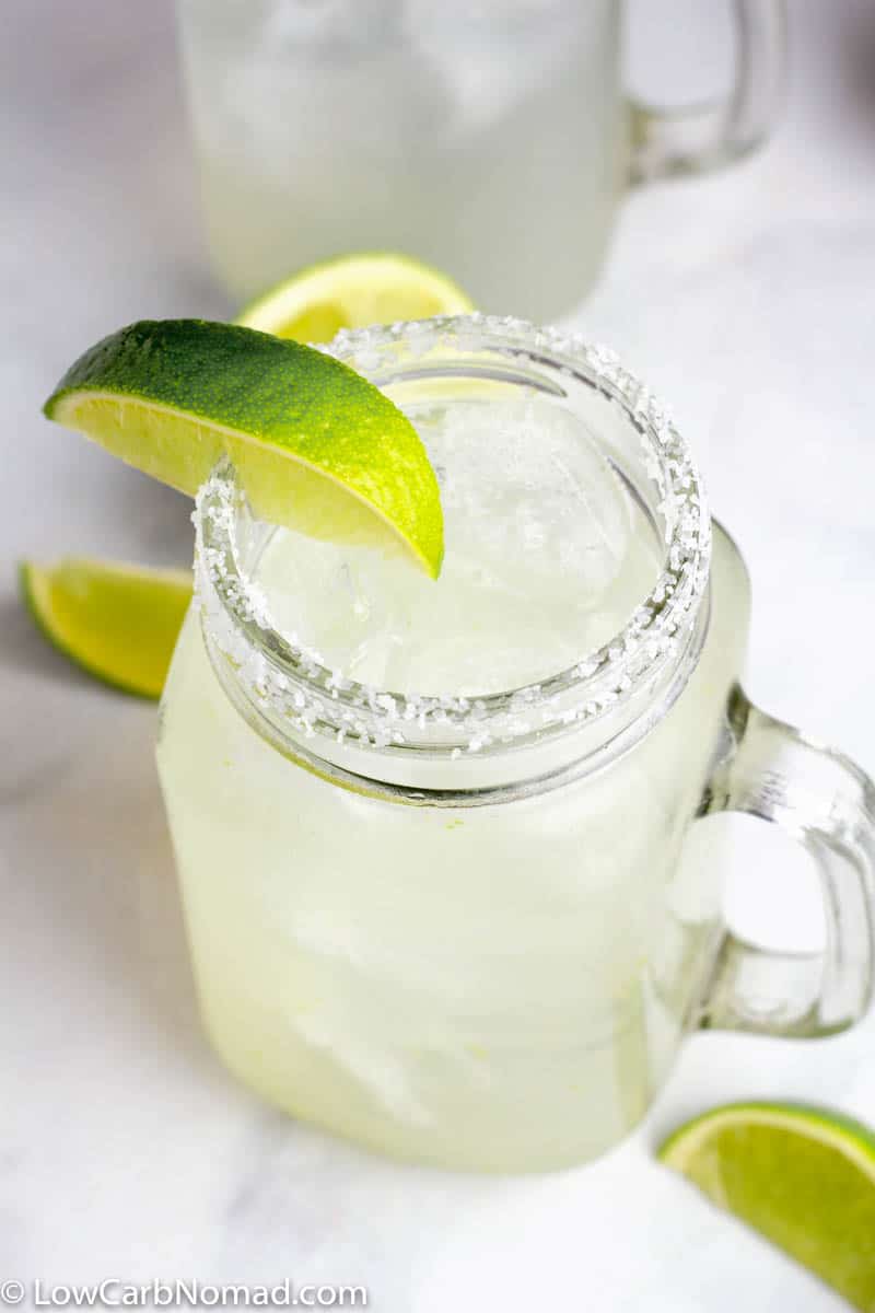 Low Carb Skinny Margarita Recipe in a mason jar glass garnished with a lime and sea salt