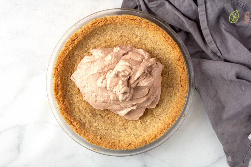 Chocolate Mousse poured into low carb pie crust