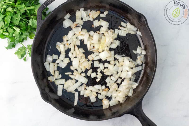 onion cooking in skillet