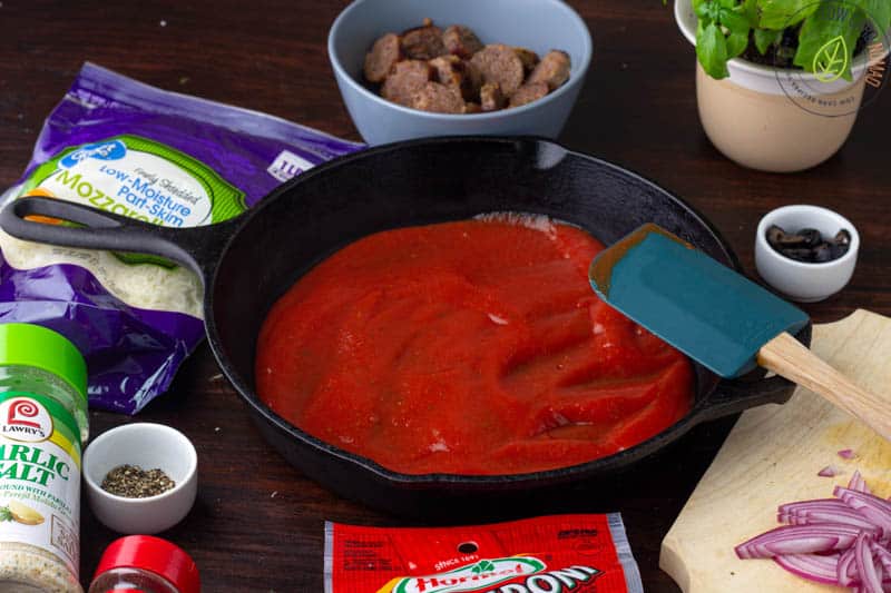 sauce in pan for crustless pizza