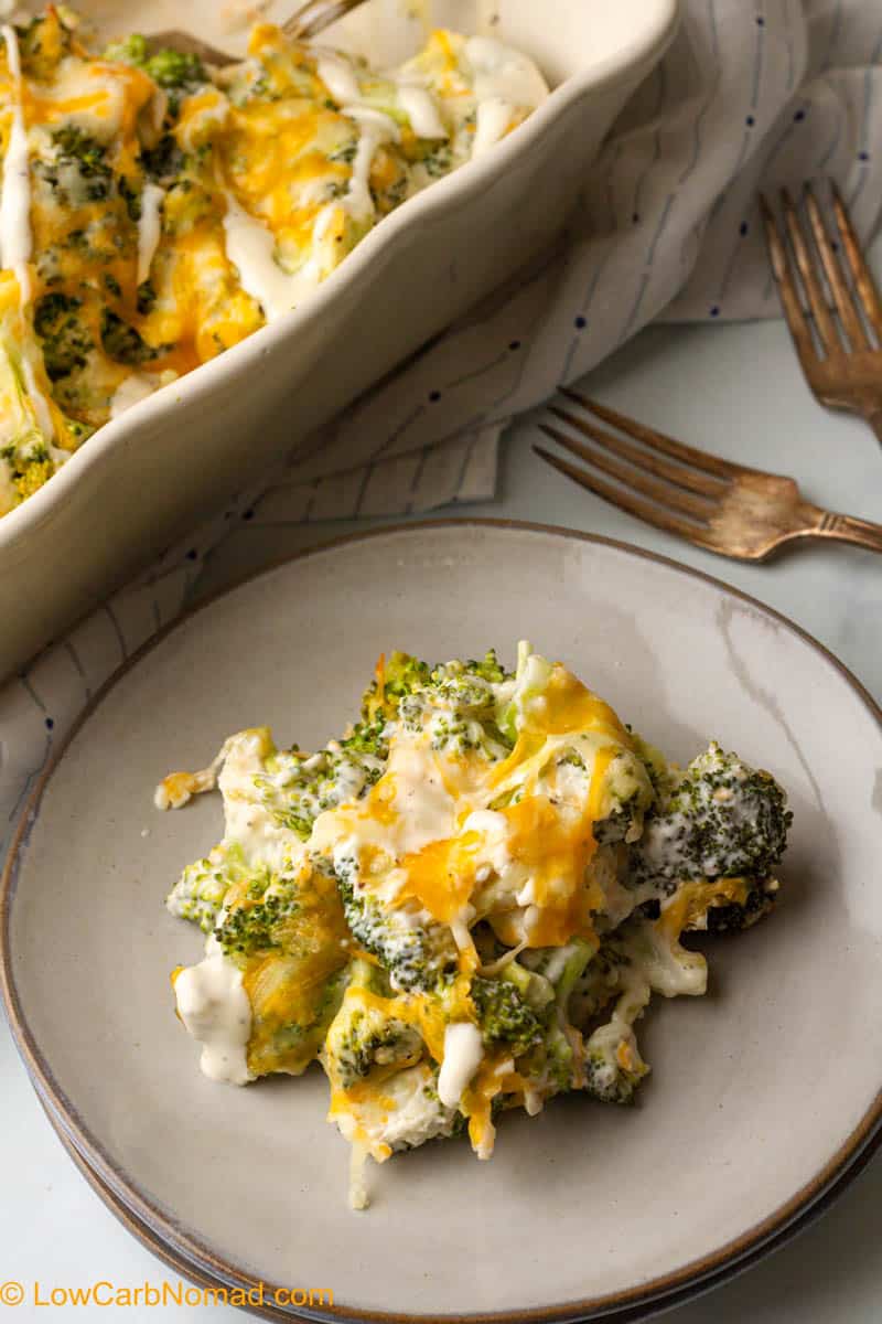 Healthy Broccoli cheese casserole on a plate being served.