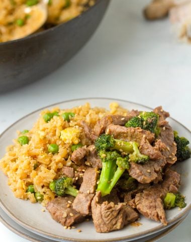 close up photo of low carb Keto Beef and Broccoli on a plate served with rice