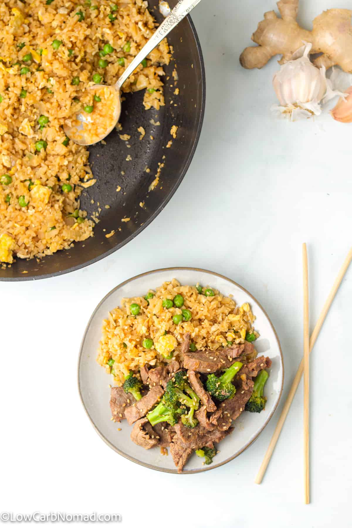 overhead photo of low carb Keto Beef and Broccoli served with cauliflower fried rice on a plate 