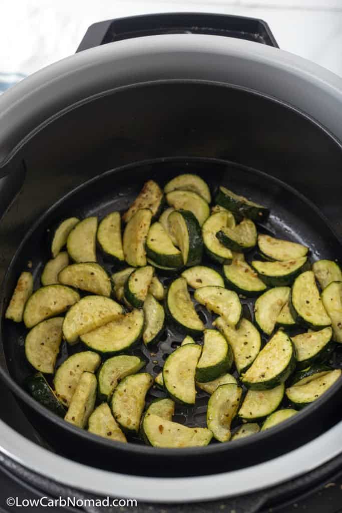 cooked zucchini in air fryer basket