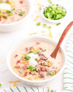 Keto Cheeseburger Soup in a white bowl with a spoon