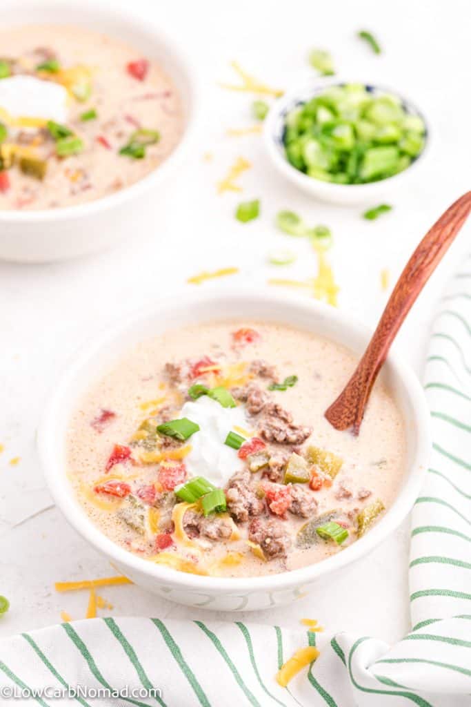 Keto Cheeseburger Soup in a white bowl with a spoon