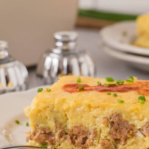side view of Sausage Egg and Cheese Breakfast Casserole on a plate