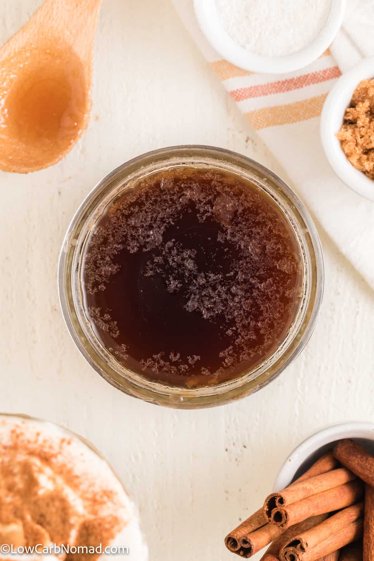 overhead photo of Sugar Free Cinnamon Dolce Syrup in a mason jar