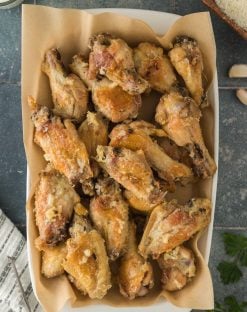 overhead photo of a dish of Garlic Parmesan Chicken wings