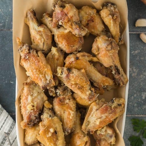 overhead photo of a dish of Garlic Parmesan Chicken wings