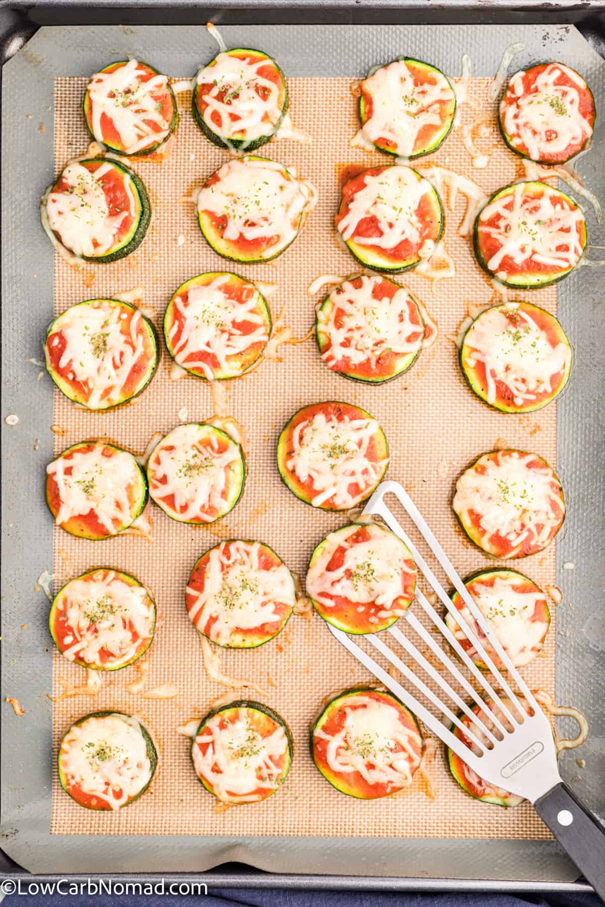 overhead photo of Zucchini Pizza Bites on a baking sheet 